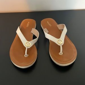 White leather flip flops